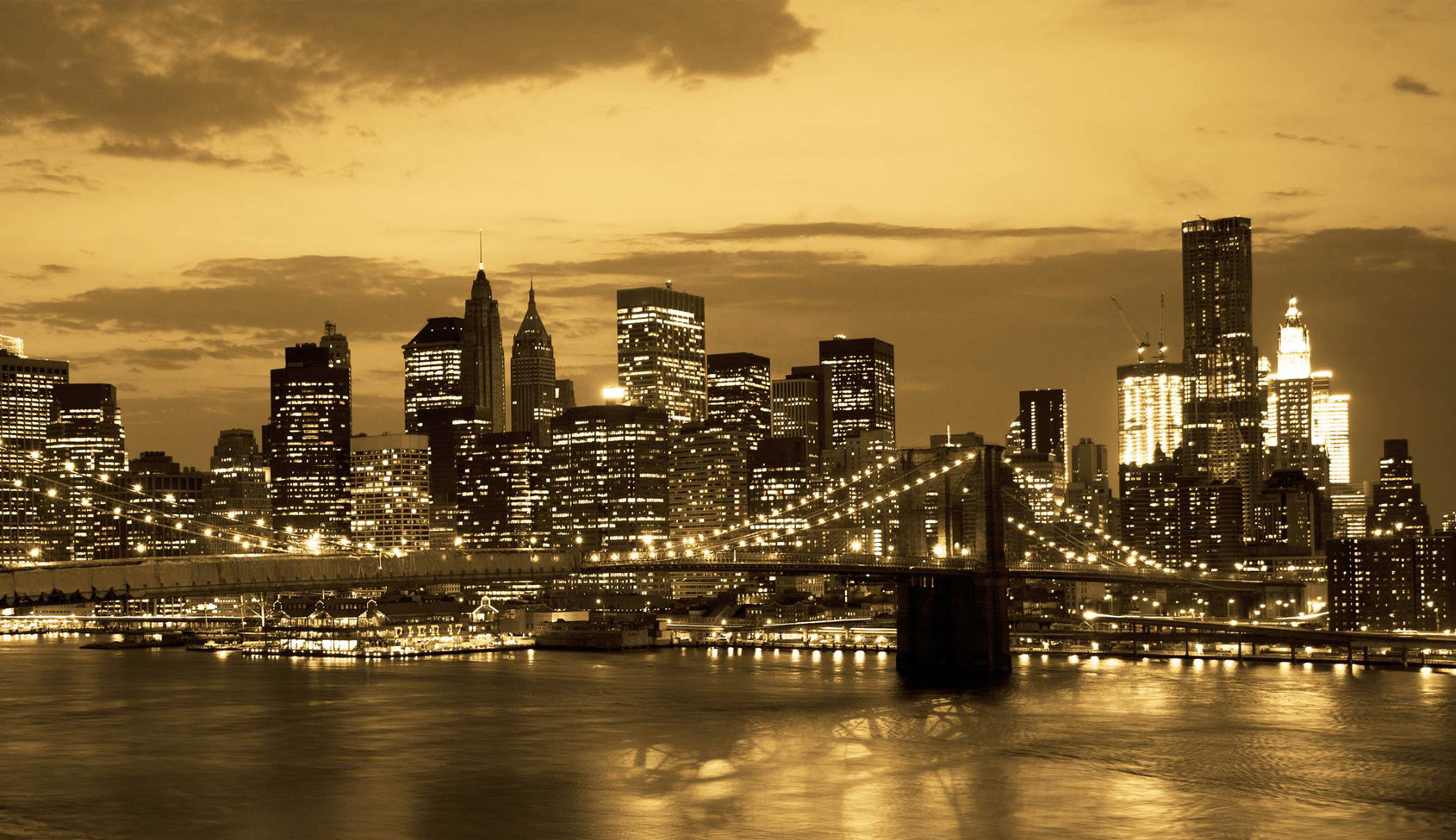 Panorama orașului New York cu Podul Brooklyn la apus