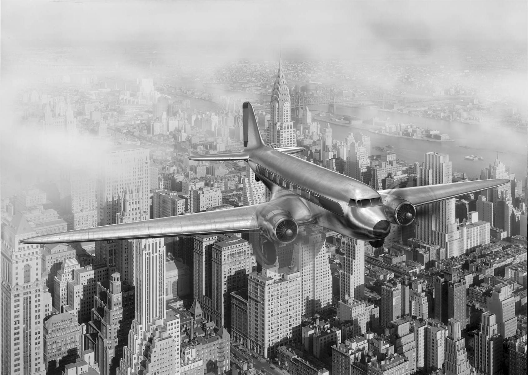 Avion vintage deasupra orașului