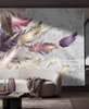Wall Mural - Feathers on a gray background