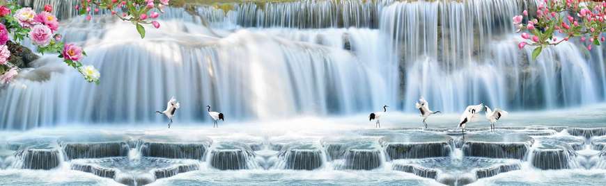 Фотообои - Красивый голубой водопад с озером и аистами.