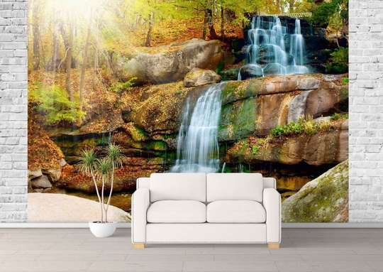 Wall Mural - Waterfall and large rocks against the background of winding trees
