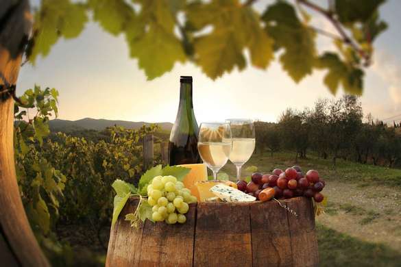 Wall Mural - Wine with grapes on the background of the field