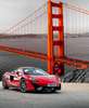 Wall Mural - Red bridge with a car