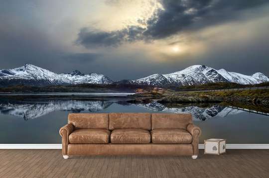 Wall Mural - Clouds over the mountains at sunset