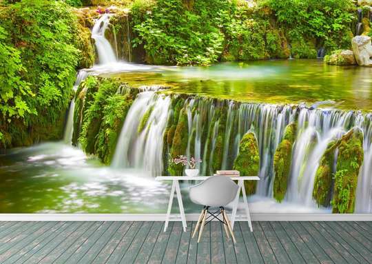Wall Mural - Cascade on a background of green plants