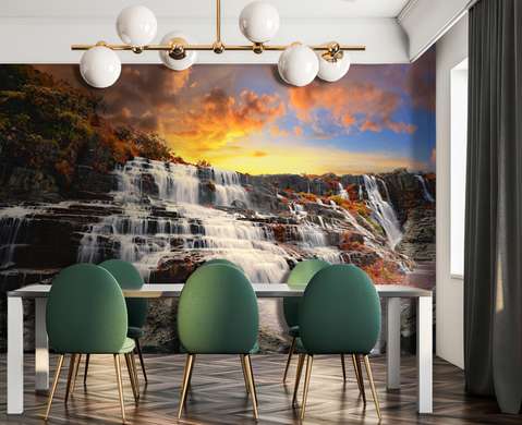 Wall Mural - Rocky waterfall at sunset