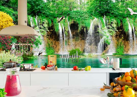 Wall Mural - Beautiful view of the green park with a waterfall