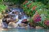 Wall Mural - Small waterfall in the garden