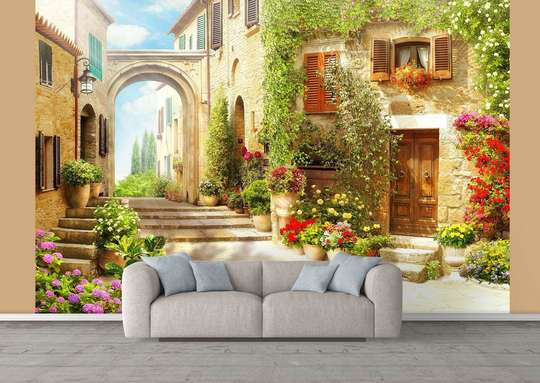 Wall mural overlooking a green courtyard in Tuscany, Italy.
