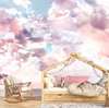 Nursery Wall Mural - Delicate clouds with pink hues