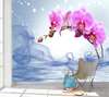 Wall Mural - Pink orchids on a blue background
