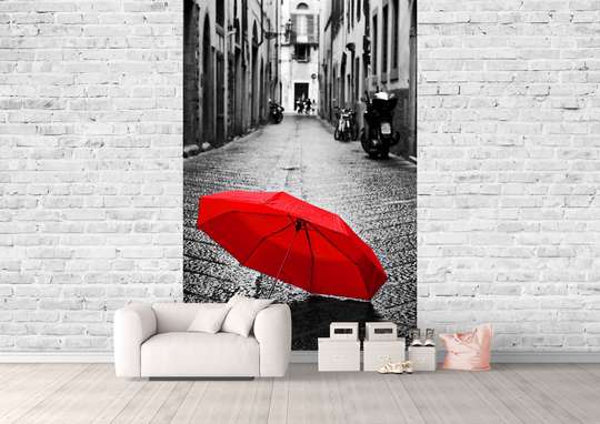 Fototapet - O umbrelă roșie pe asfalt