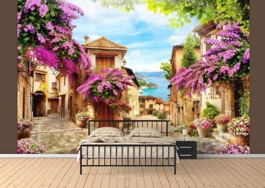 Wall mural with lilac flowers in an old courtyard in Italy.