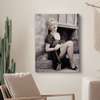 Poster - Portrait of Marilyn Monroe near the wall, 60 x 90 см, Framed poster, Famous People