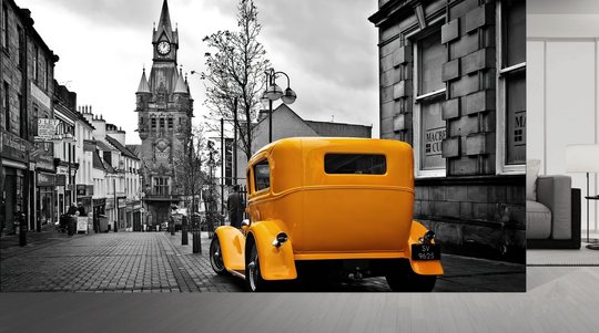 Fototapet, Mașină galbenă în oraș alb-negru
