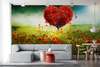 Wall Mural - Scarlet tree in the shape of a heart in a poppy field