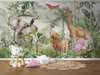 Wall mural - Safari animals in the jungle and exotic birds on a green background