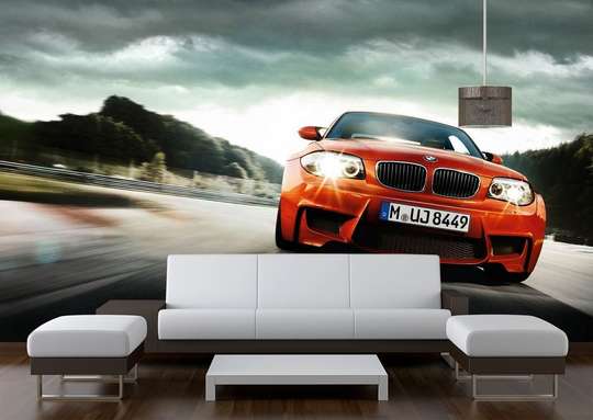 Wall Mural - Orange car on a background of clouds.