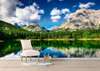 Wall Mural - Lake in the forest against the backdrop of a mountain landscape