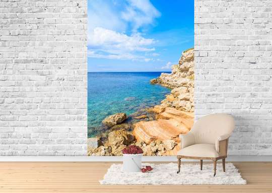 Wall Mural - Seashore against the backdrop of a sunny sky