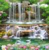 Wall mural - The rocky waterfall, the birds and lotus flowers