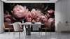 Wall mural - Pink peonies on a black background