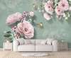 Wall Mural - Pale pink flowers on a green background