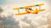 Wall Mural - Yellow airplane in the sky