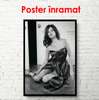 Poster - Kate Moss in a dress sits near the wall, 60 x 90 см, Framed poster
