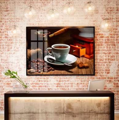 Poster - A cup of coffee on the table against the background of a coffee grinder, 90 x 60 см, Framed poster, Food and Drinks