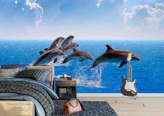 Wall Mural - Dolphins in the ocean