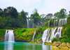 Wall Mural - Cascade on the background of a green forest