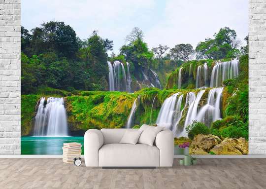 Wall Mural - Cascade on the background of a green forest
