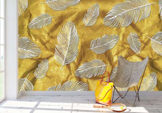 Wall Mural - Golden leaves on a beige background