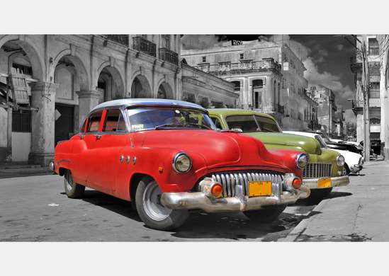 Wall Mural - Red car along a black and white street.