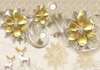 Wall Mural - Gold flowers brooches on an abstract background